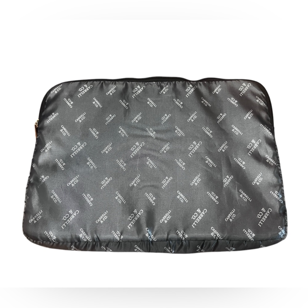 Silver and black Cabrelli & CO. inner laptop case